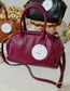 BAULETTO APERTURA A SCATTO IN PELLE DOLLARO " MOIRA "
