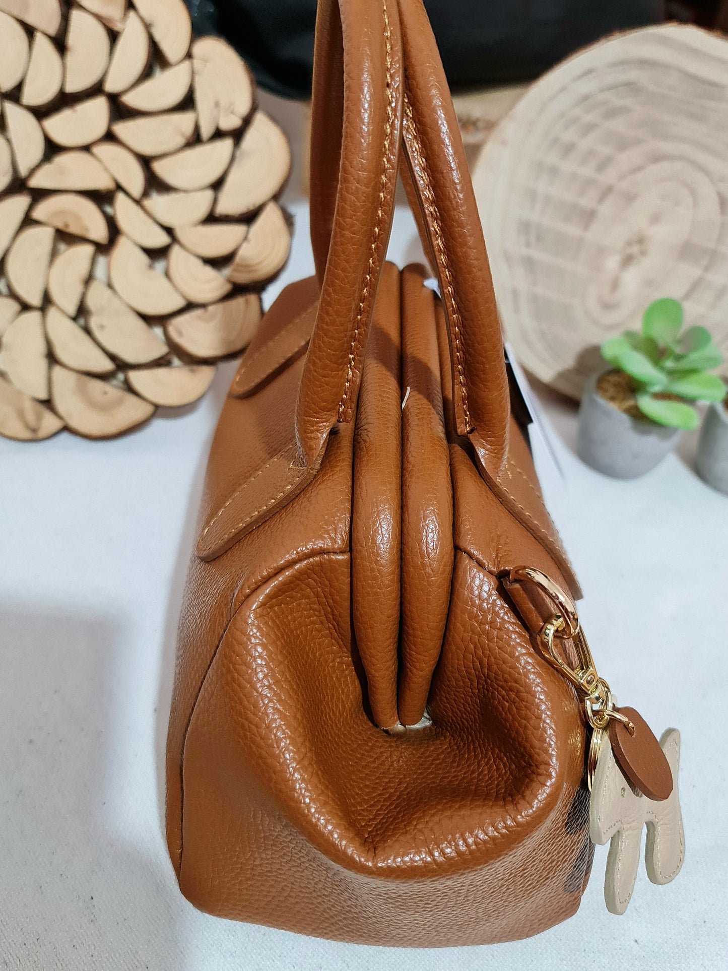 BAULETTO APERTURA A SCATTO IN PELLE DOLLARO " MOIRA "