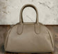 BAULETTO APERTURA A SCATTO IN PELLE DOLLARO " MOIRA "