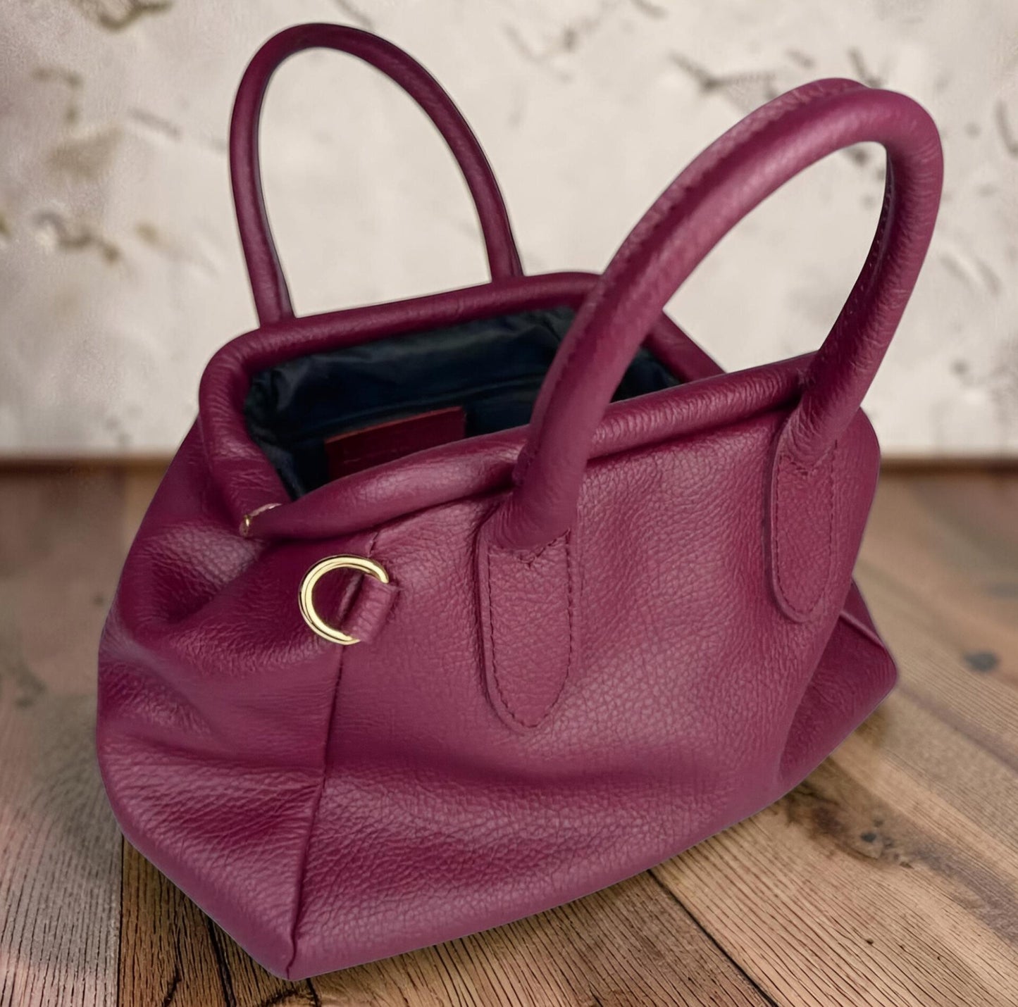 BAULETTO APERTURA A SCATTO IN PELLE DOLLARO " MOIRA "